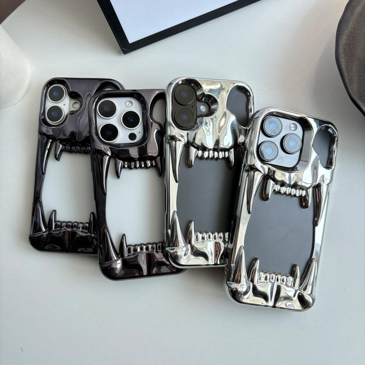 Stylish Cool Metal Glossy Silver Black Skull Tusk Hollow Heat Dissipation Soft Cover Case for iPhone 12 13 14 15 16 17 Pro Max